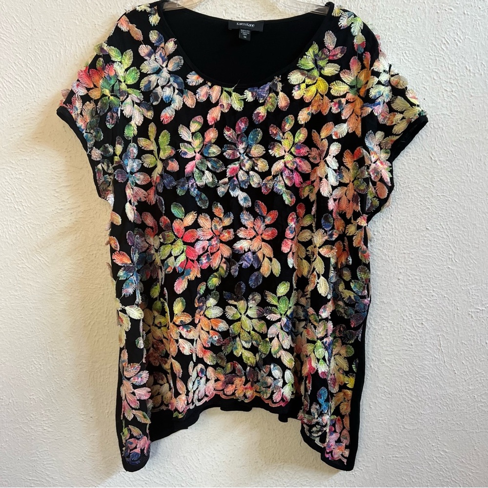 Karen Kane black knit shirt cut fabric leaf pattern